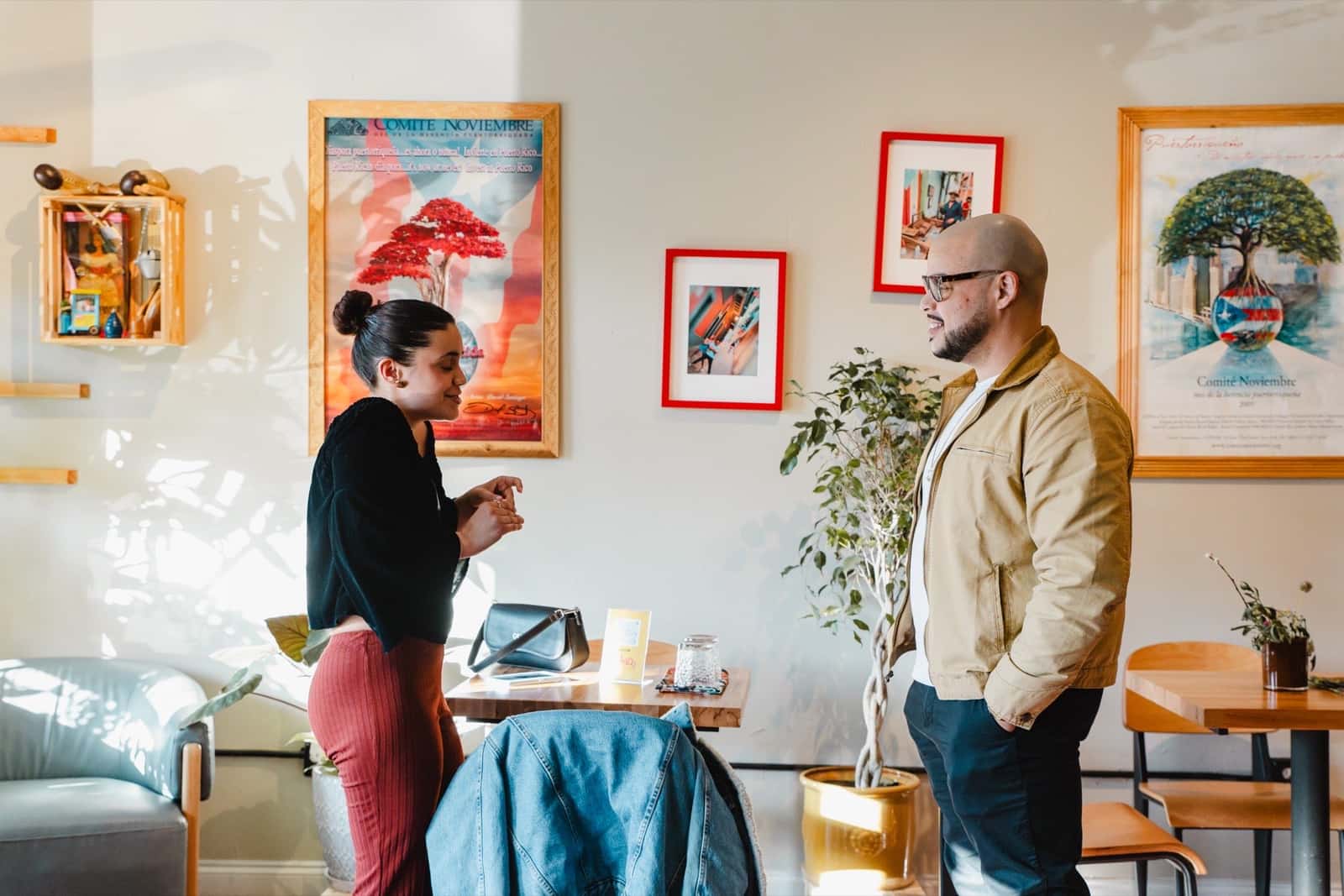 Two Colado Latino Network guests in conversation at Bodega and Vino in Baltimore